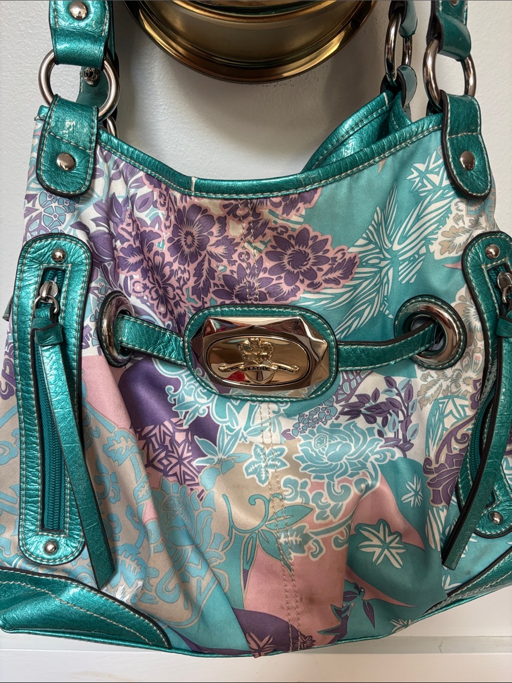 Kathy Van Zeeland Y2K floral shoulder bag featuring teal metallic trim